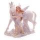 Hada lila brillante floral y figuras de unicornio